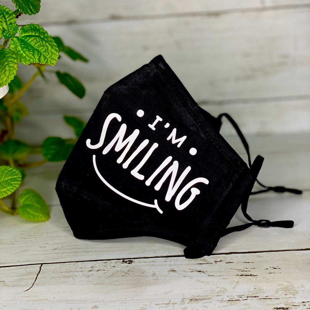 Face mask with “I’m smiling”